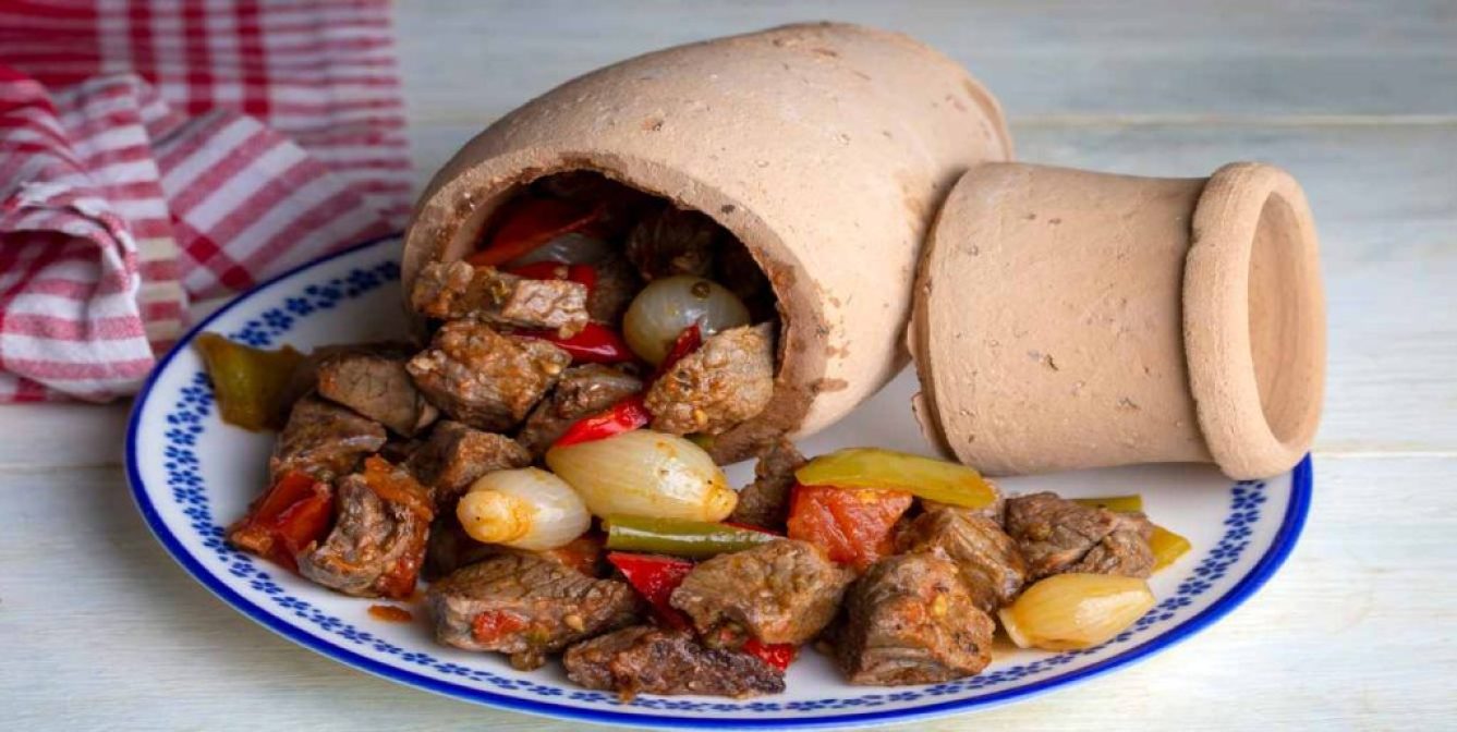 Authentic Turkish Testi Kebab cooked in earthenware waterjug, Tu